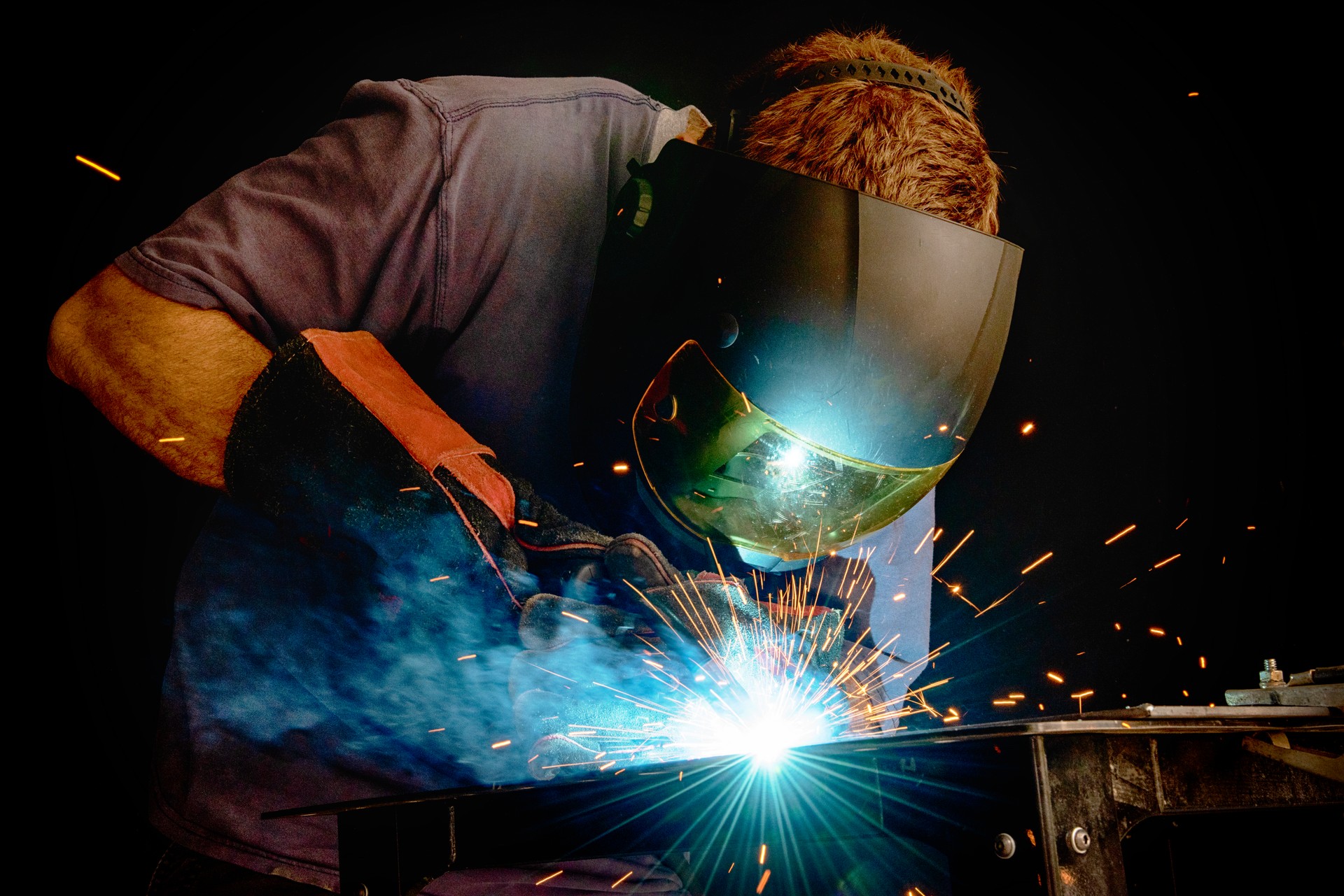 One Skilled Worker Welding Steel